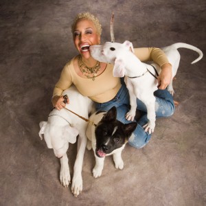 Ami Moore the Chicago Dog Coach with three dogs